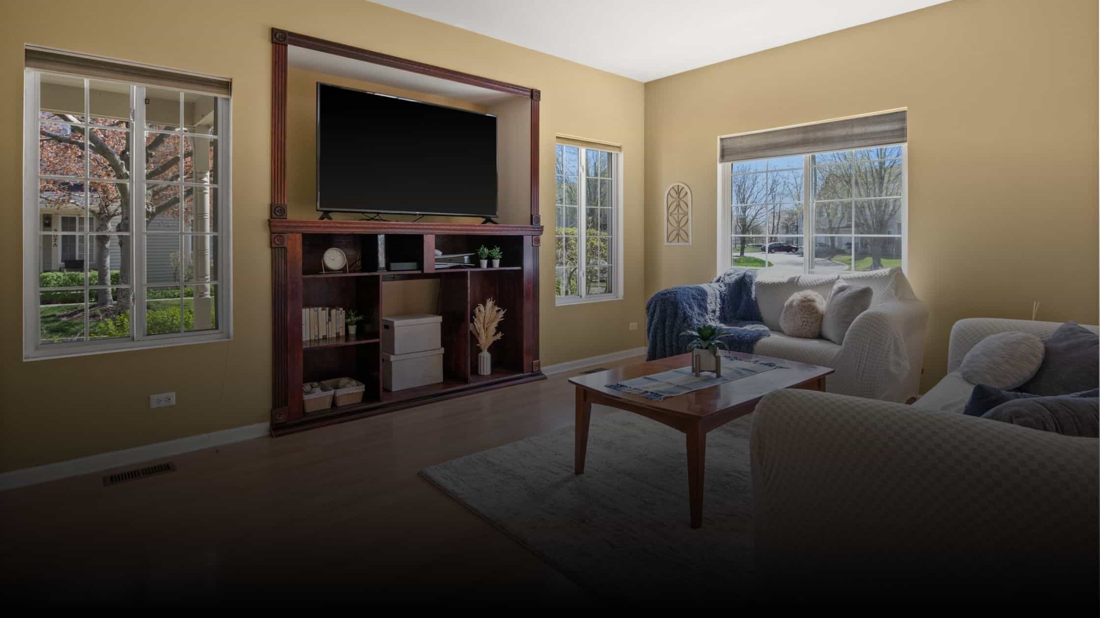 Living room at 303 Windsor Ct, Unit A, in Concord Woods of South Elgin, Illinois